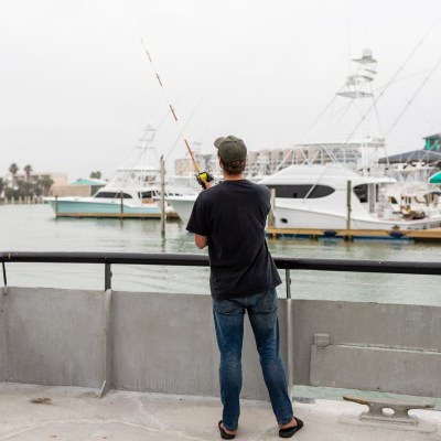 a man standing on a bridge