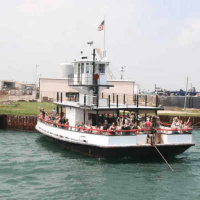 a small boat in a large body of water