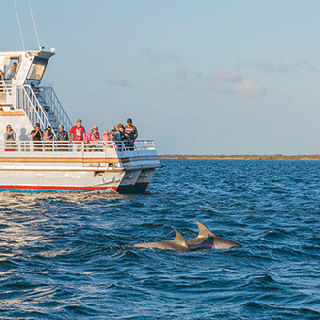 a small boat in a large body of water