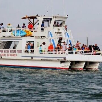 a small boat in a large body of water