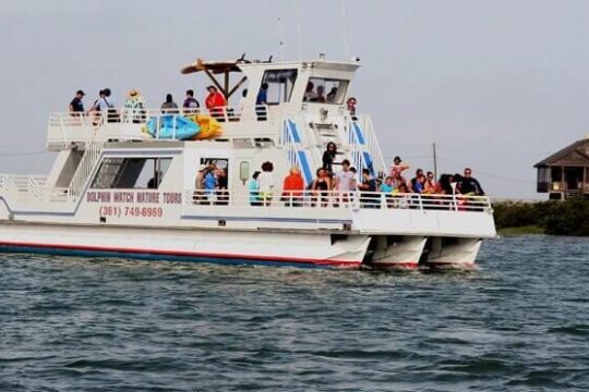 a small boat in a large body of water